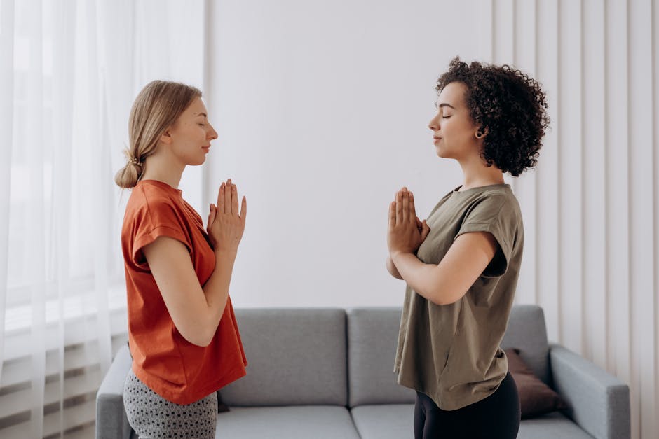 Woman practicing gentle chair yoga in a bright room